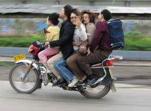 12050 B / 300 x 221 / 5 on motorbike.jpg